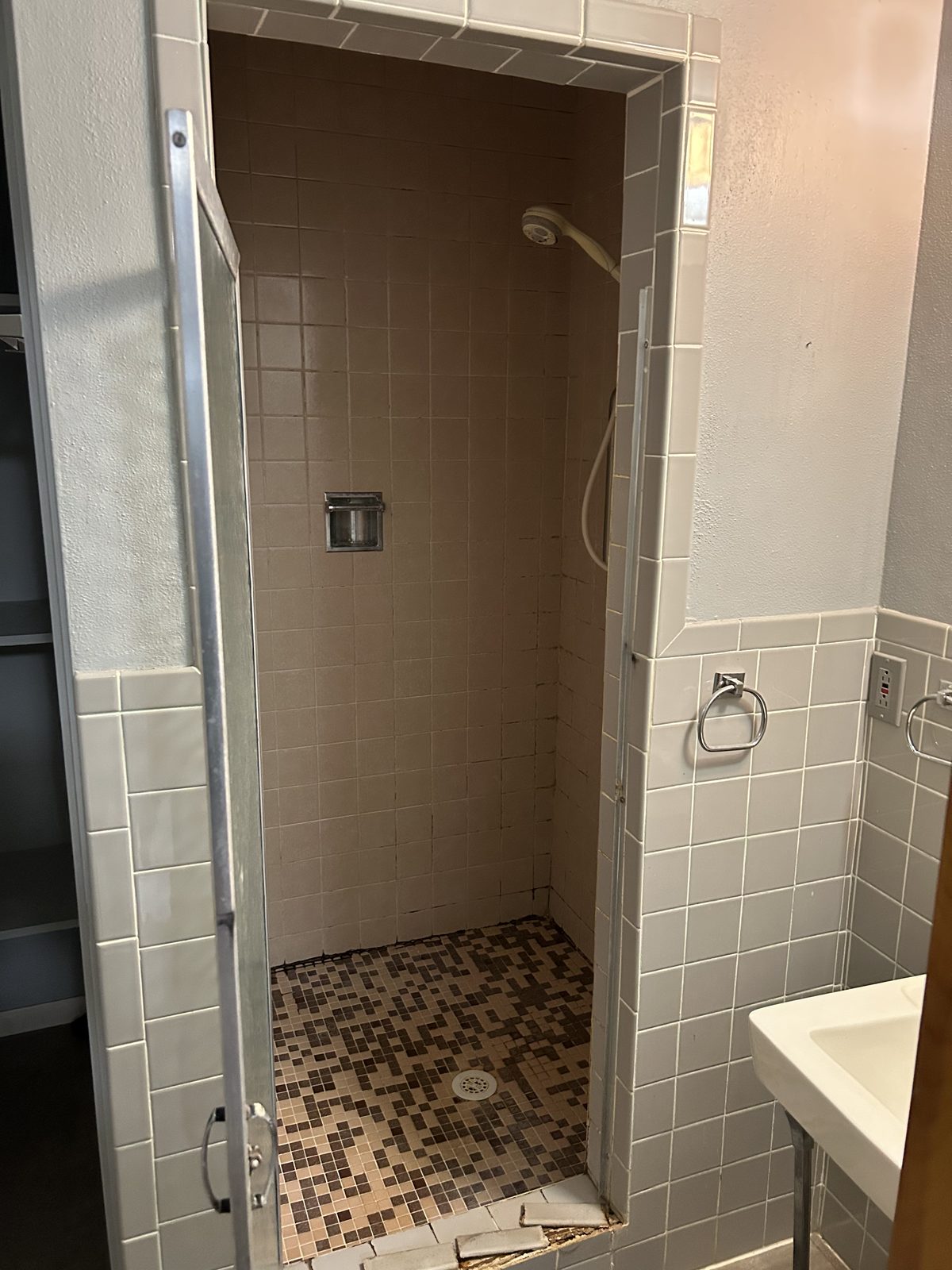 Original tile shower before the remodel